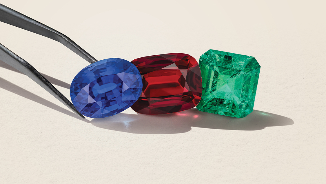 blue, red and green colored gemstones