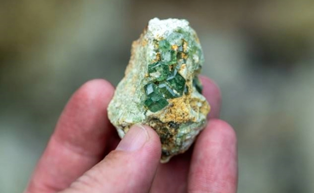 Demantoid garnet rough mined from northern Madagascar. Photo: Wim Vertriest/GIA.