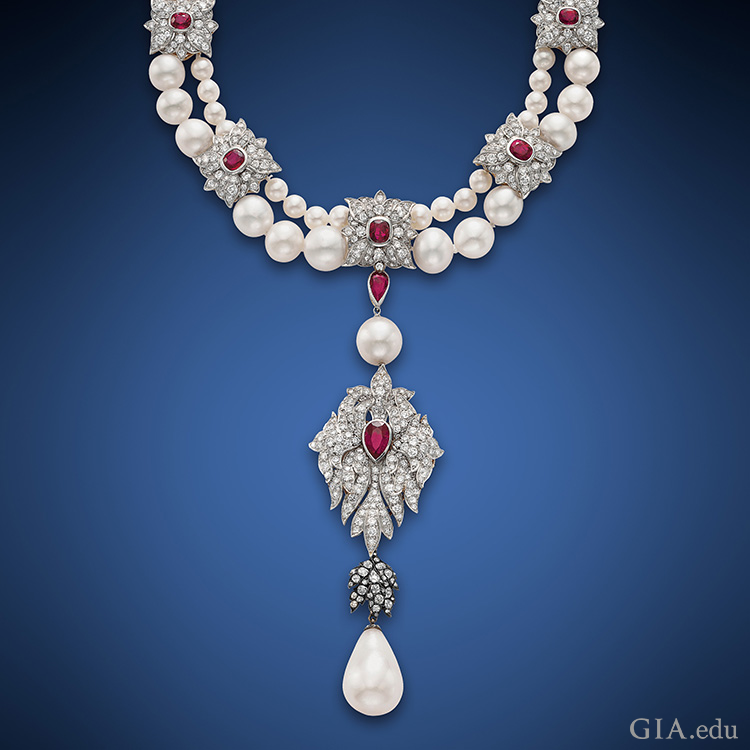 Cartier set Elizabeth Taylor’s historic 50.56 ct La Peregrina pearl as part of the pendant to this two-strand pearl, ruby and diamond necklace. Courtesy: Christie's Cartier set Elizabeth Taylor’s historic 50.56 ct La Peregrina pearl as part of the pendant to this two-strand pearl, ruby and diamond necklace. Courtesy: Christie's