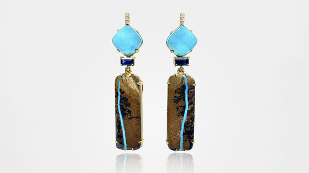 “Nile” earrings featuring a one-of-a-kind pair of Royston River turquoise, chrysocolla druzy, blue spinels, and diamonds in 14K yellow gold. Courtesy of Eleux Jewelry. “Nile” earrings featuring a one-of-a-kind pair of Royston River turquoise, chrysocolla druzy, blue spinels, and diamonds in 14K yellow gold. Courtesy of Eleux Jewelry.