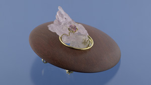 This intriguing piece, called “Emptiness in a Circle,” was inspired by Shel Silverstein's children’s book, “The Missing Piece.” It features wood, rose quartz, imperial topaz, and 18K gold. It can be worn as either a pendant or a brooch. - Photo by Don Mengason, © GIA, gift of Maria Lucia Barbosa. This intriguing piece, called “Emptiness in a Circle,” was inspired by Shel Silverstein's children’s book, “The Missing Piece.” It features wood, rose quartz, imperial topaz, and 18K gold. It can be worn as either a pendant or a brooch. - Photo by Don Mengason, © GIA, gift of Maria Lucia Barbosa.