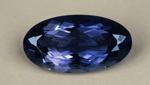 This iolite is unusual for its quality and size. It weighs 18.90 carats. Fine iolite over 5 carats is relatively rare. This iolite is unusual for its quality and size. It weighs 18.90 carats. Fine iolite over 5 carats is relatively rare.