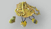 Necklaces, pendants, statuette, and slab of serpentine 