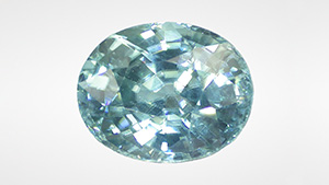 Long-wave UV exposure changes zircon’s color from medium light greenish blue (left) to very dark yellowish green (right). Long-wave UV exposure changes zircon’s color from medium light greenish blue (left) to very dark yellowish green (right).