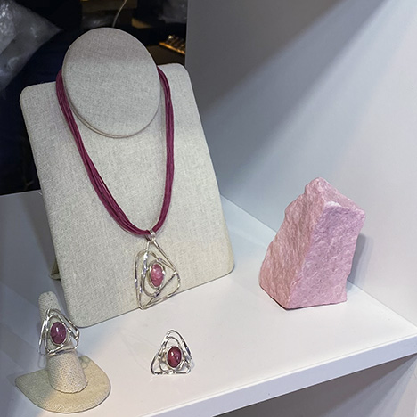 Scandinavian jewelry designs featuring thulite. Scandinavian jewelry designs featuring thulite.