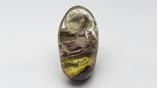 Quartz with rose-shaped cluster of inclusions Quartz with rose-shaped cluster of inclusions