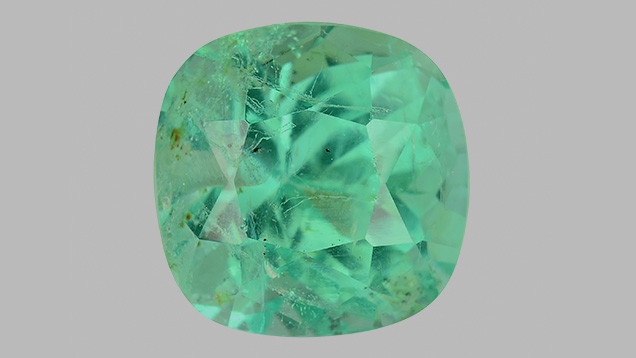 Emerald with two drill holes Emerald with two drill holes