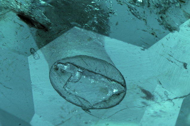 Drill hole under microscope. Drill hole under microscope.