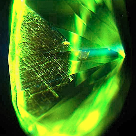 Green crosshatched pattern in synthetic diamond. Green crosshatched pattern in synthetic diamond.
