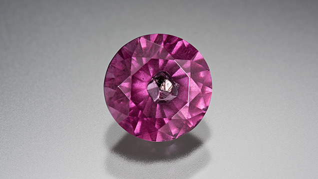 Pyrope garnet with metal sulfide inclusion Pyrope garnet with metal sulfide inclusion