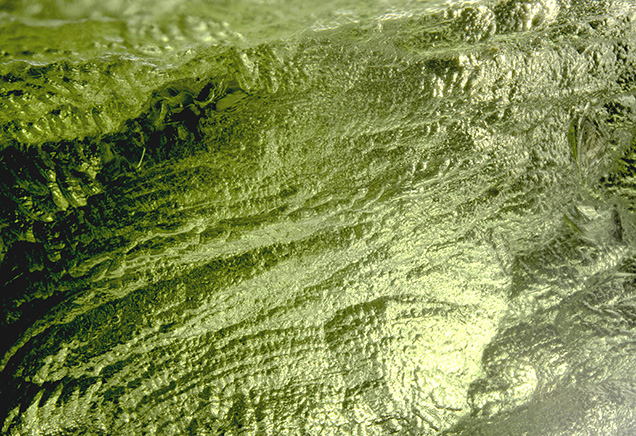 Moldavite with natural flow lines.