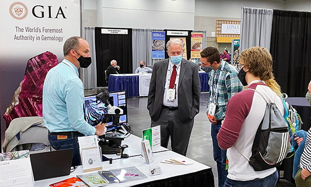 Visitors at the GIA booth at GSA. Visitors at the GIA booth at GSA.