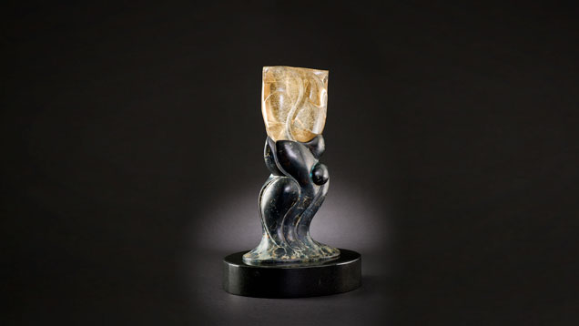 This rutilated smoky quartz sculpture – virtually free of feathers or flaws with very even dispersion of rutile needles – is from Rio Grande do Sul, Brazil. This rutilated smoky quartz sculpture – virtually free of feathers or flaws with very even dispersion of rutile needles – is from Rio Grande do Sul, Brazil.