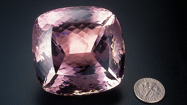 Cut Kunzite with Dime - Quality Factors Cut Kunzite with Dime - Quality Factors