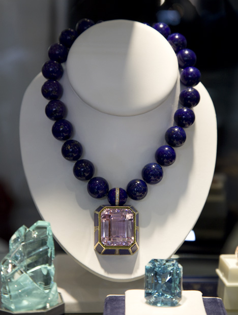 Lapis Lazuli. This display of gems from Afghanistan features a large kunzite pendant suspended from a necklace of 18 mm lapis beads. - Valerie Power, courtesy ASMED/Gem Hunters Corp.