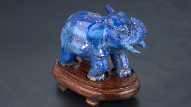 Lapis Lazuli. This adorable carving of a baby elephant shows off a variety of blue lapis shades. – Orasa Weldon, gift of William F. Larson