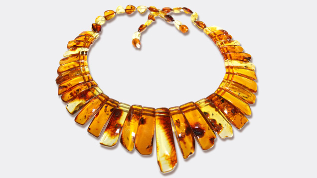 Amber Beads. Amber beads come in a wide variety of shapes and can be quite large due to their light weight. - Irena Misevic/Shutterstock
