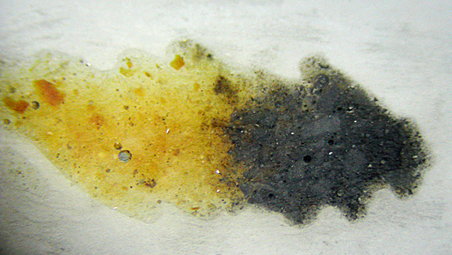 Gas bubbles and spherical pores in the brown and black areas. Gas bubbles and spherical pores in the brown and black areas.