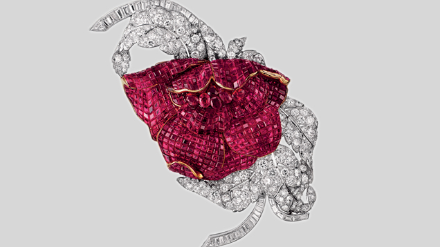 This Peony clip has petals composed of 700 Mystery-set square Burmese rubies, a heart made of six oval faceted rubies, and foliage made of 43 baguette and 196 round diamonds. The rubies weigh 60 ct total, the diamonds 30 ct. Photo courtesy of Van Cleef & Arpels. This Peony clip has petals composed of 700 Mystery-set square Burmese rubies, a heart made of six oval faceted rubies, and foliage made of 43 baguette and 196 round diamonds. The rubies weigh 60 ct total, the diamonds 30 ct. Photo courtesy of Van Cleef & Arpels.