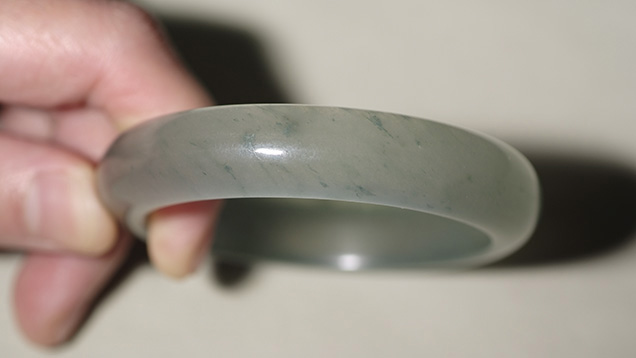 Bangle of polymer-impregnated aventurine quartz Bangle of polymer-impregnated aventurine quartz