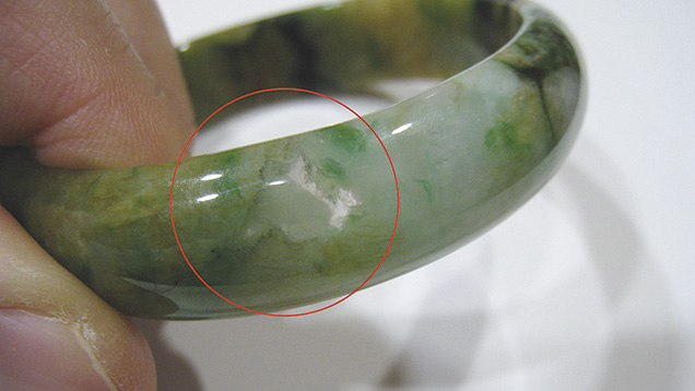Jadeite bangle showing transparent area