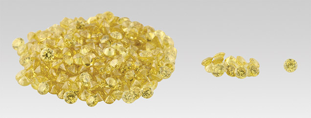 Group of intensely colored round yellow diamonds Group of intensely colored round yellow diamonds