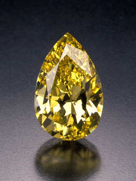 A large pear shaped yellow diamond A large pear shaped yellow diamond
