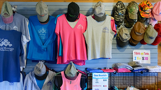 Shirts and hats in a store Shirts and hats in a store
