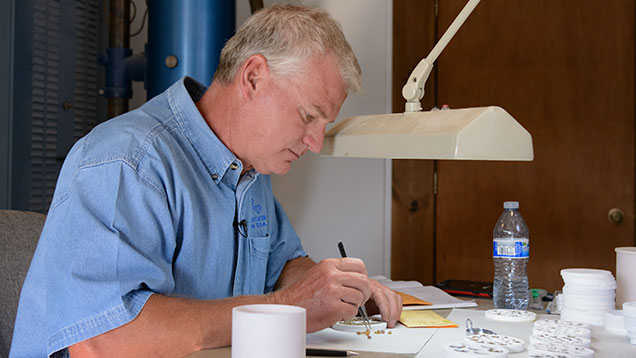 Man working on stones Man working on stones