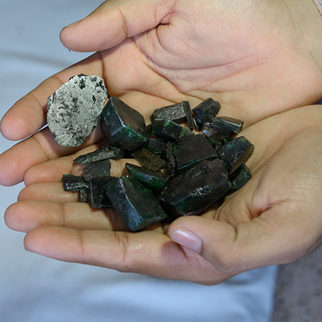 Handful of emerald rough Handful of emerald rough