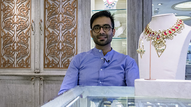 Man in jewelry store Man in jewelry store