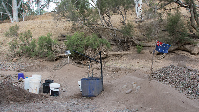 Buckets, equipment, and Australian flag