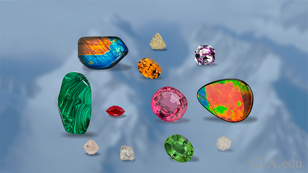 Multi-colored gems are superimposed on an image of glacier peaks. Multi-colored gems are superimposed on an image of glacier peaks.