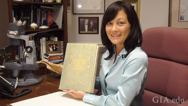Woman holding an old book