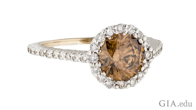 Image of white gold ring with brown diamond center stone surrounded by halo of white diamonds Image of white gold ring with brown diamond center stone surrounded by halo of white diamonds