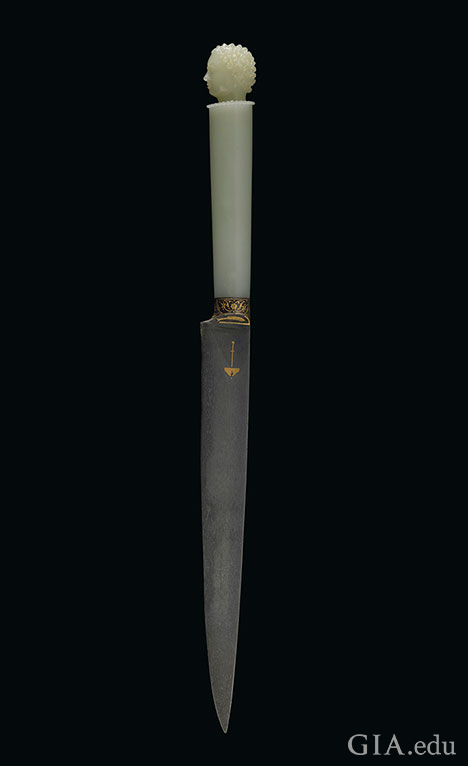 A white jadite dagger.