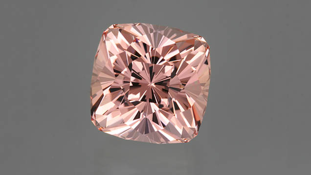 Morganite. This skillfully fashioned morganite has the salmon-to-peach color typical of untreated material. - John Dyer, gem courtesy of John Dyer & Co.