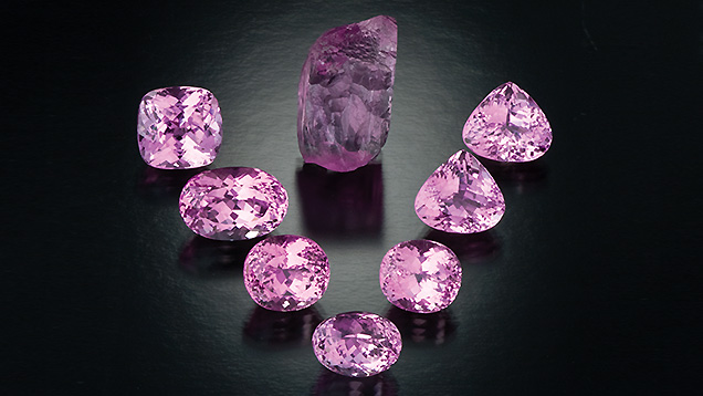 Kunzite Crystal and Faceted Stones Kunzite Crystal and Faceted Stones