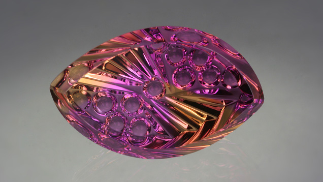 Beautiful Ametrine. The best ametrines show distinct areas of orangy yellow and purple. These colors are featured in this graceful cut design. Photo by Lydia Dyer, © John Dyer & Co., gem courtesy John Dyer & Co.