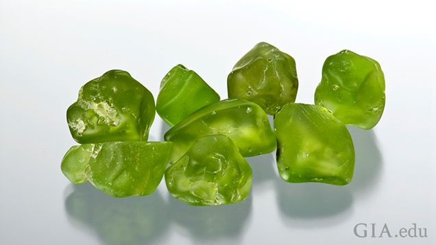 Eight pieces of peridot rough. Eight pieces of peridot rough.
