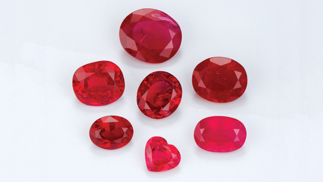 Untreated and Heat-treated Rubies. The mixture of these untreated and heat-treated rubies show a range of darker and brighter red colors. Photo: Robert Weldon/GIA. Courtesy: Tommy Wu, Shire Trading Ltd., Hong Kong