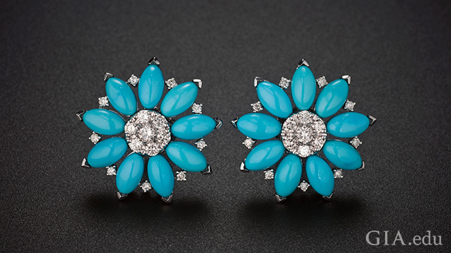 Two flower earrings feature Sleeping Beauty turquoise petals with diamond centers. Two flower earrings feature Sleeping Beauty turquoise petals with diamond centers.