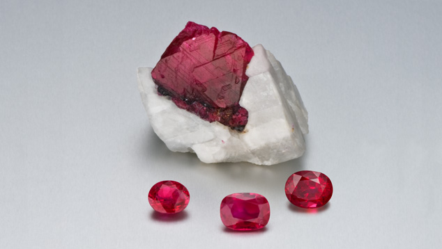 Various Cuts of Rubies. Rubies are commonly cut into oval and cushion shapes. – Photo: Robert Weldon/GIA. Rough: Gift of William F. Larson. Cut stone: Courtesy: Edward Boehm.