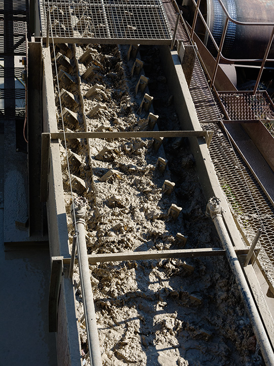 9_189114-540x720.jpg. Part of the ore processing involves removal of sticky, claylike material from the gravels. Photo by Andrew Lucas/GIA.