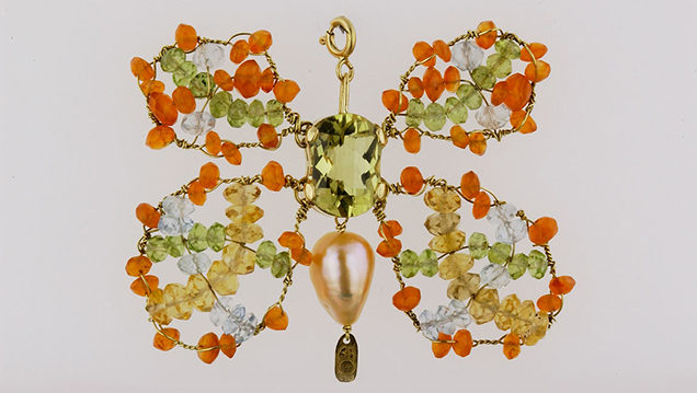 Beaded-butterfly-Pendant-44031_636x358.jpg. Designed by Bialice Duarte, this butterfly pendant in 18K yellow gold features a fantasy cut green gold quartz, peridot, aquamarine, citrine, tourmaline and a freshwater rose pearl. Photo by Don Mengason/GIA, gift of Bialice Duarte