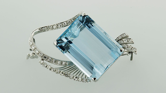 Brooch-44022_636x358.jpg. This 18K white gold and diamond brooch features a 55 carat aquamarine. The design of the brooch is a fusion of Art Nouveau and Classical style. Photo by Don Mengason/GIA, gift of H. Stern Jewelers, Brazil