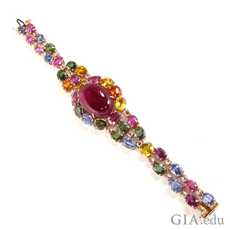 The “Candy” bracelet by VTse Jewelry is comprised of a red oval cabochon tourmaline and multi-colored sapphires. Courtesy VTse Jewelry The “Candy” bracelet by VTse Jewelry is comprised of a red oval cabochon tourmaline and multi-colored sapphires. Courtesy VTse Jewelry