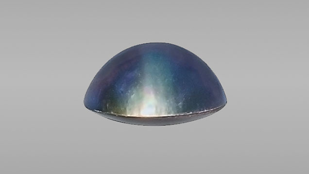 Blue-violet assembled cultured blister pearl. Blue-violet assembled cultured blister pearl.