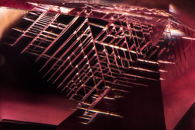 F15-MW-Figure-2_191082-636x423.jpg. Cleavage along octahedral planes of pink diamond.