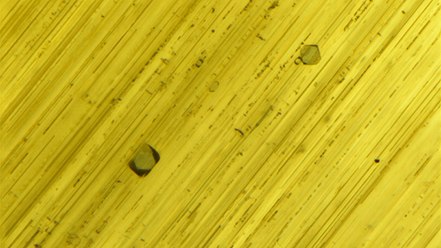 Blue octahedral crystals visible under fiber-optic illumination. Blue octahedral crystals visible under fiber-optic illumination.